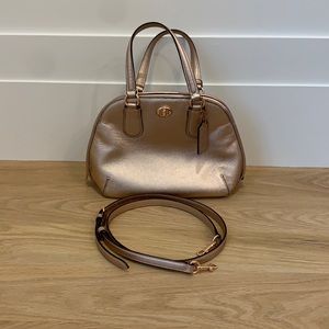 Rose gold leather Coach bag with removable crossbody strap and full zipper top